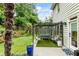 Lush backyard featuring a pergola-covered patio, outdoor seating, and beautiful landscaping, ideal for outdoor living at 1450 Crescent Walk, Decatur, GA 30033