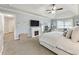 Vaulted ceiling bedroom with a fireplace, a sitting area, and neutral tones at 1450 Crescent Walk, Decatur, GA 30033