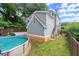 Backyard featuring a swimming pool and a private deck, ideal for outdoor relaxation and entertainment at 1797 Olive Se St, Atlanta, GA 30315