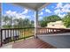 Balcony view with railing overlooking mature trees and the neighborhood at 1797 Olive Se St, Atlanta, GA 30315