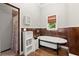 Bright bathroom with a soaking tub, wooden accents, and natural light creating a relaxing atmosphere at 1797 Olive Se St, Atlanta, GA 30315