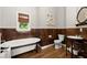 Elegant bathroom featuring a soaking tub, modern fixtures, and wood paneled walls for a classic look at 1797 Olive Se St, Atlanta, GA 30315