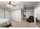 Relaxing bedroom with plush carpeting and a cozy reading nook, perfect for unwinding after a long day at 1797 Olive Se St, Atlanta, GA 30315
