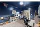 The bedroom has blue walls, a blue starry sky ceiling, carpet, and an open door to the outside at 1797 Olive Se St, Atlanta, GA 30315