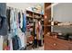 Organized walk-in closet with ample shelving, hanging space, and storage solutions at 1797 Olive Se St, Atlanta, GA 30315