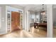 Elegant entryway leading to dining room featuring hardwood floors, large windows, and natural light at 1797 Olive Se St, Atlanta, GA 30315