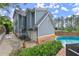 A two-story home offers a two-car garage, basketball hoop, and an above-ground pool at 1797 Olive Se St, Atlanta, GA 30315