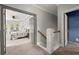 Hallway view leading into a bedroom and another room with stairway access at 1797 Olive Se St, Atlanta, GA 30315
