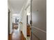 Inviting hallway featuring hardwood floors and access to other areas of the home at 201 W Ponce De Leon Ave # 13, Decatur, GA 30030