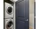 A stacked washer and dryer are conveniently located in a closet at 201 W Ponce De Leon Ave # 13, Decatur, GA 30030
