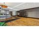 Grand lobby with hardwood floors, decorative metal art, reception desk, and ample open space at 201 W Ponce De Leon Ave # 13, Decatur, GA 30030