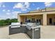 An outdoor kitchen with a grill and counter space for entertaining at 201 W Ponce De Leon Ave # 13, Decatur, GA 30030