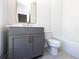 Charming bathroom features modern vanity, gold accents, and tiled shower and flooring at 205 Midnight Oak Run # 5, Alpharetta, GA 30009