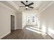 Bedroom showcasing windows for natural light, a ceiling fan and neutral wall color at 205 Midnight Oak Run # 5, Alpharetta, GA 30009