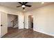 Spacious bedroom featuring access to an ensuite bathroom and stairs to another floor at 205 Midnight Oak Run # 5, Alpharetta, GA 30009