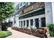 The Crate & Barrel and El Felix exteriors feature modern design and sidewalk dining at 205 Midnight Oak Run # 5, Alpharetta, GA 30009