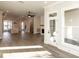 Open floor plan living room with combined kitchen, living room, and fireplace at 205 Midnight Oak Run # 5, Alpharetta, GA 30009