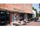 Outdoor seating at South Main Kitchen, brick building with a rustic aesthetic at 205 Midnight Oak Run # 5, Alpharetta, GA 30009