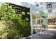 The Pinkberry storefront features modern design and a vertical garden at 205 Midnight Oak Run # 5, Alpharetta, GA 30009