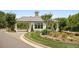 Community entrance featuring well-maintained landscaping, architectural details, and a welcoming entry gate at 419 Southland Cir, Canton, GA 30115