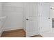 Spacious walk-in closet with wire shelving and wood flooring at 419 Southland Cir, Canton, GA 30115