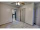 Bedroom featuring neutral walls and carpet, with a doorway to the kitchen at 50 Woodland St, Buford, GA 30518