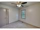 Bedroom with fan, carpet, and closet at 50 Woodland St, Buford, GA 30518