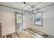Cozy entry room with an exterior door and a window providing natural light to the wood-look flooring at 50 Woodland St, Buford, GA 30518