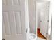 A bathroom features a modern toilet and doorway access to a bathroom at 3827 Shenfield Dr, Union City, GA 30291