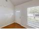 Bright entryway with natural light, featuring hardwood floors and a white front door at 3827 Shenfield Dr, Union City, GA 30291