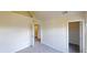 Bedroom with light colored walls, carpet, and a closet at 4162 Ward Lake Trl, Ellenwood, GA 30294
