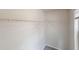Walk-in closet with wire shelving and a window for natural light at 4162 Ward Lake Trl, Ellenwood, GA 30294