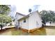 Back exterior of home, showing siding, AC, and foundation at 4162 Ward Lake Trl, Ellenwood, GA 30294