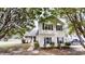 Charming two-story home with black shutters and mature trees shading the landscaped front yard at 4162 Ward Lake Trl, Ellenwood, GA 30294