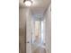 Hallway with neutral paint, carpet, and a flush mount light fixture at 4162 Ward Lake Trl, Ellenwood, GA 30294