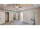 Spacious main bedroom with tray ceiling, ceiling fan, walk-in closet, and ensuite bath at 4162 Ward Lake Trl, Ellenwood, GA 30294