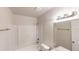 Clean bathroom features a shower-tub combo with a sliding shower door at 5574 Oak Grove Dr, Acworth, GA 30102
