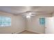 Bright bedroom with fan, carpet and natural lighting at 5574 Oak Grove Dr, Acworth, GA 30102