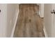 Hallway featuring vinyl wood flooring and clean trim at 5574 Oak Grove Dr, Acworth, GA 30102