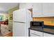 Functional kitchen featuring ample cabinet space and modern appliances; a microwave is included at 812 Manning Sw Way, Marietta, GA 30064