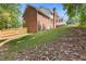Expansive backyard and the rear exterior of the home at 828 Jami Ct, Lawrenceville, GA 30046