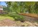 Side yard with green space and a wooden fence at 828 Jami Ct, Lawrenceville, GA 30046