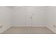 The unfinished basement has white walls and neutral carpet at 828 Jami Ct, Lawrenceville, GA 30046