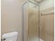Bathroom featuring a stand up shower with glass enclosure and tile surround at 828 Jami Ct, Lawrenceville, GA 30046