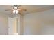 Bedroom with tan walls and ceiling fan at 828 Jami Ct, Lawrenceville, GA 30046