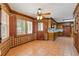 Dining room with plaid wallpaper, tile floors, and access to the kitchen at 828 Jami Ct, Lawrenceville, GA 30046