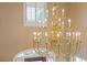 Grand foyer showcases a stunning chandelier, enhancing the home's elegant ambiance at 828 Jami Ct, Lawrenceville, GA 30046