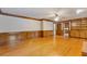 Large living room with wood floors, traditional molding and built-in shelving at 828 Jami Ct, Lawrenceville, GA 30046