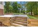 Multi-level wooden patio offers plenty of space for entertaining at 828 Jami Ct, Lawrenceville, GA 30046