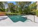 A refreshing pool surrounded by lush greenery at 828 Jami Ct, Lawrenceville, GA 30046